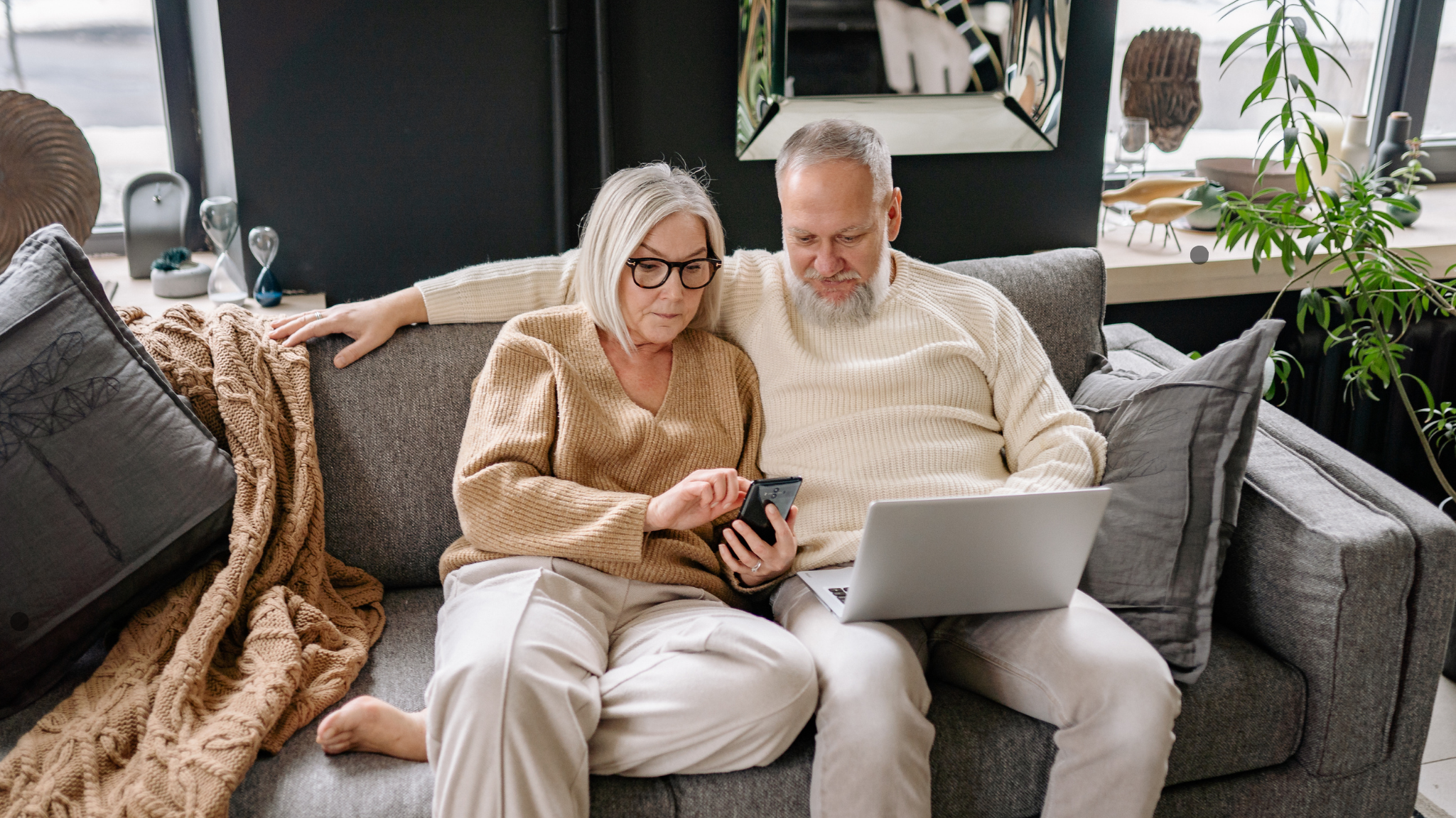 Older couple relaxing at home while considering reverse mortgage options in Oregon and Washington